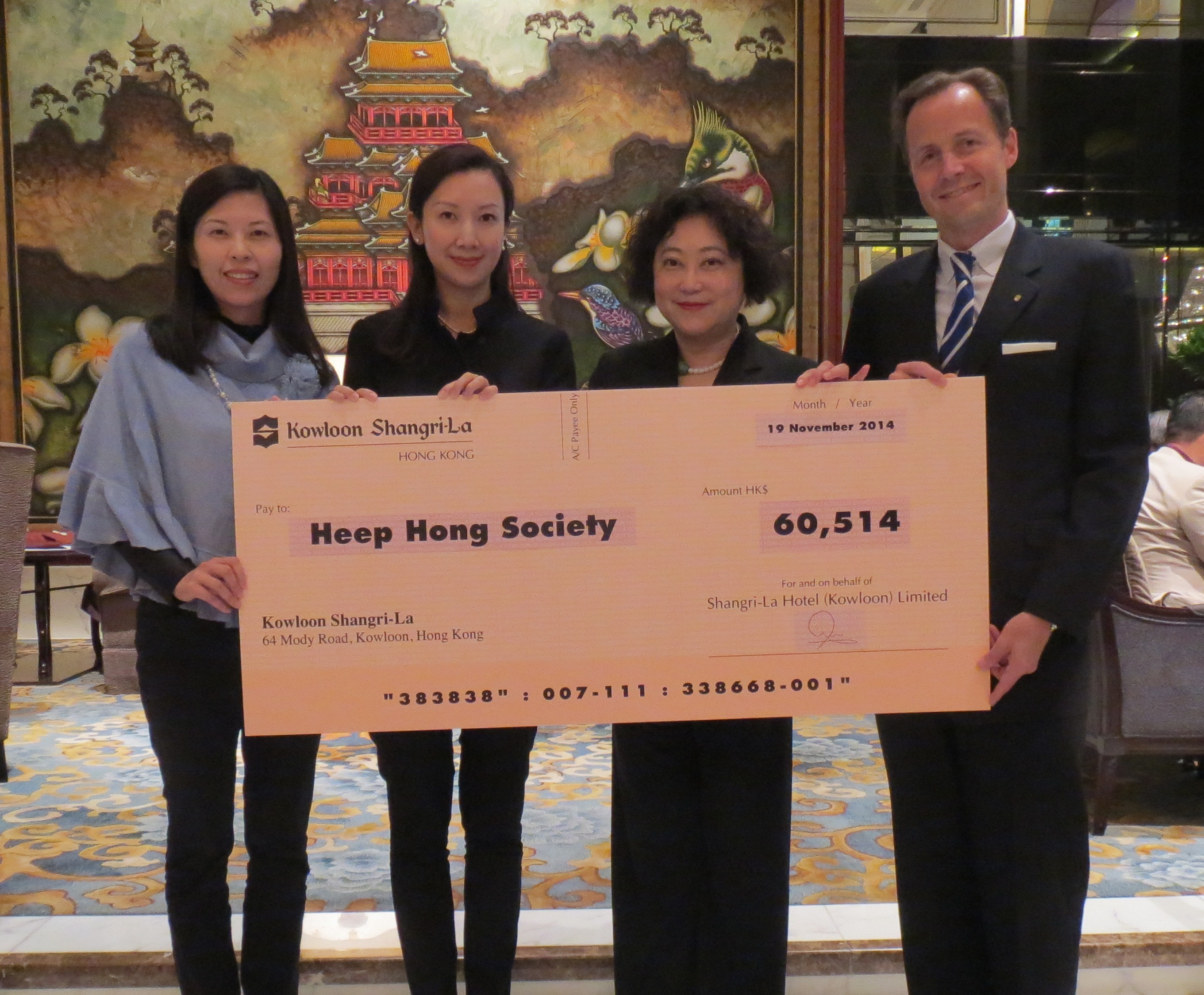 Kowloon Shangri-La, Hong Kong, presented the cheque of donation to Heep Hong Society 